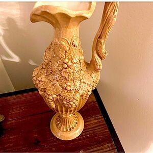 Tan color Vintage Arnels Ceramic wine  Pitcher. Grape vine pattern.
